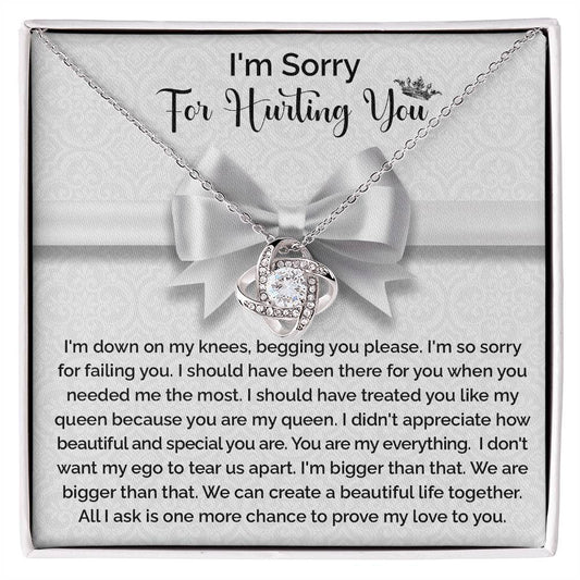 I'm sorry for hurting you/ I'm down on my knees/ Love knot necklace