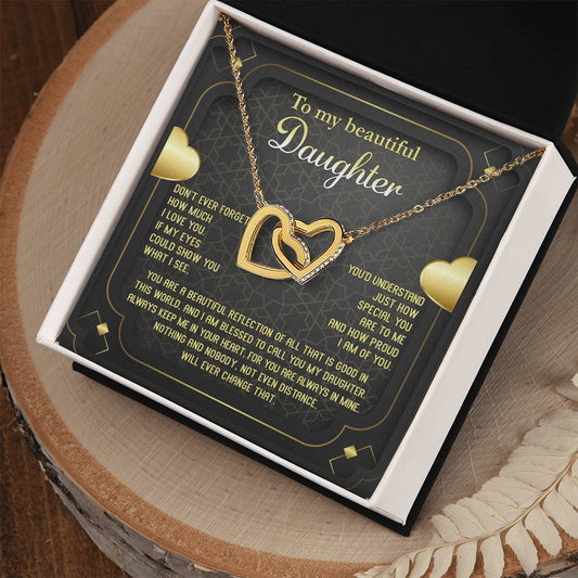 To my daughter/ You are a reflection of all that is good/ Interlocking heart necklace