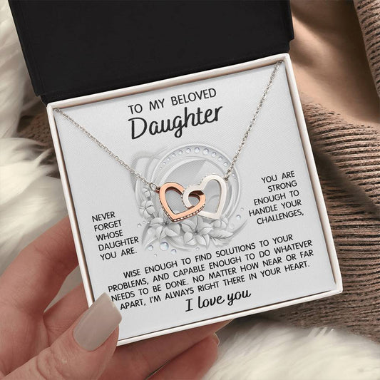 To my beloved daughter/ Never forget whose daughter you are/ Interlocking heart necklace